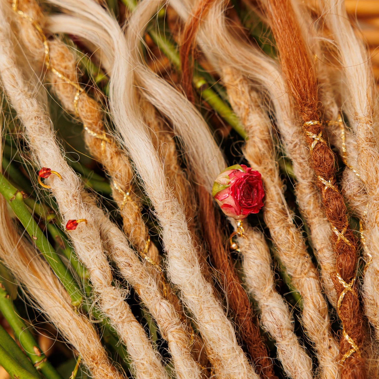 blend of soft blonde and strawberry hues in 14–18 inch boho braids