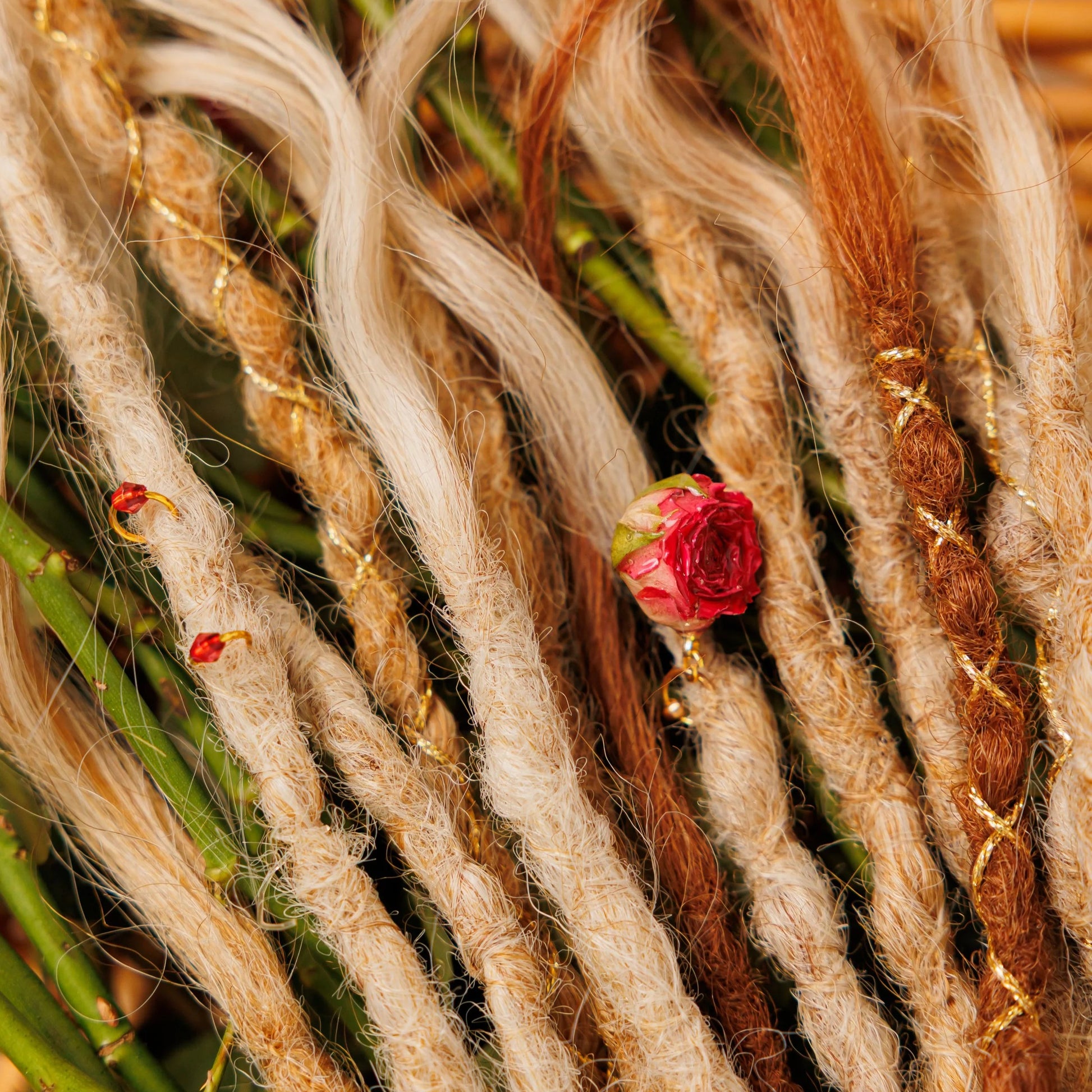 blend of soft blonde and strawberry hues in 14–18 inch boho braids