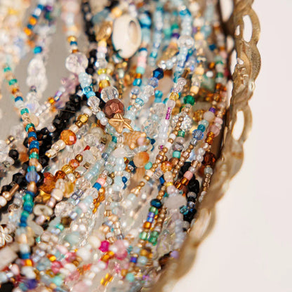 Fairy Chains inspired by garden colors and textures with mixed sparkle threads, beads, and fairy charm accents