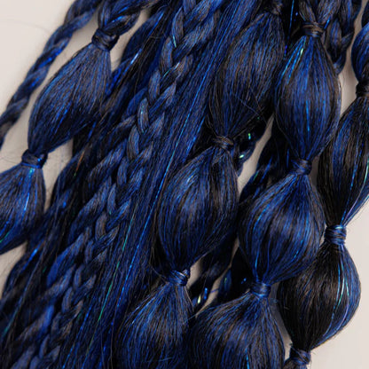 Close-up of blue braided hair extensions on a light background