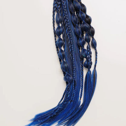 Blue braided hair extension with beads on a white background