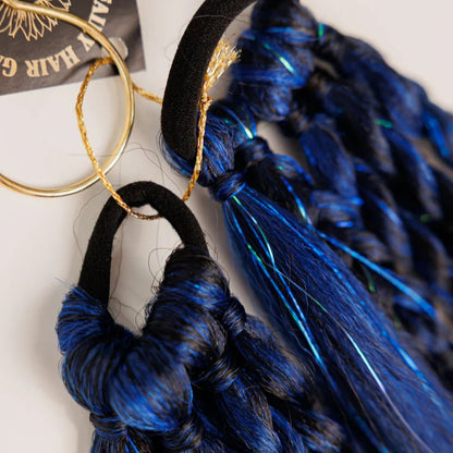 Blue braided hair extensions with gold accents on a white background