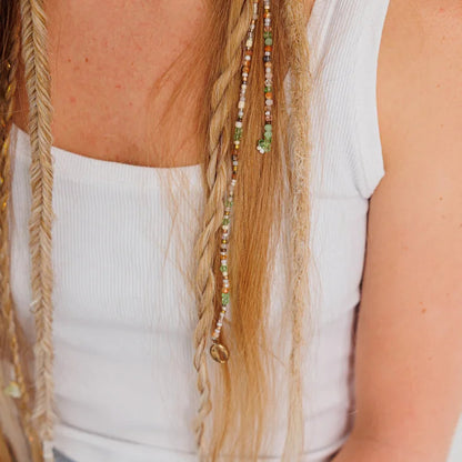 person wearing fairy chains