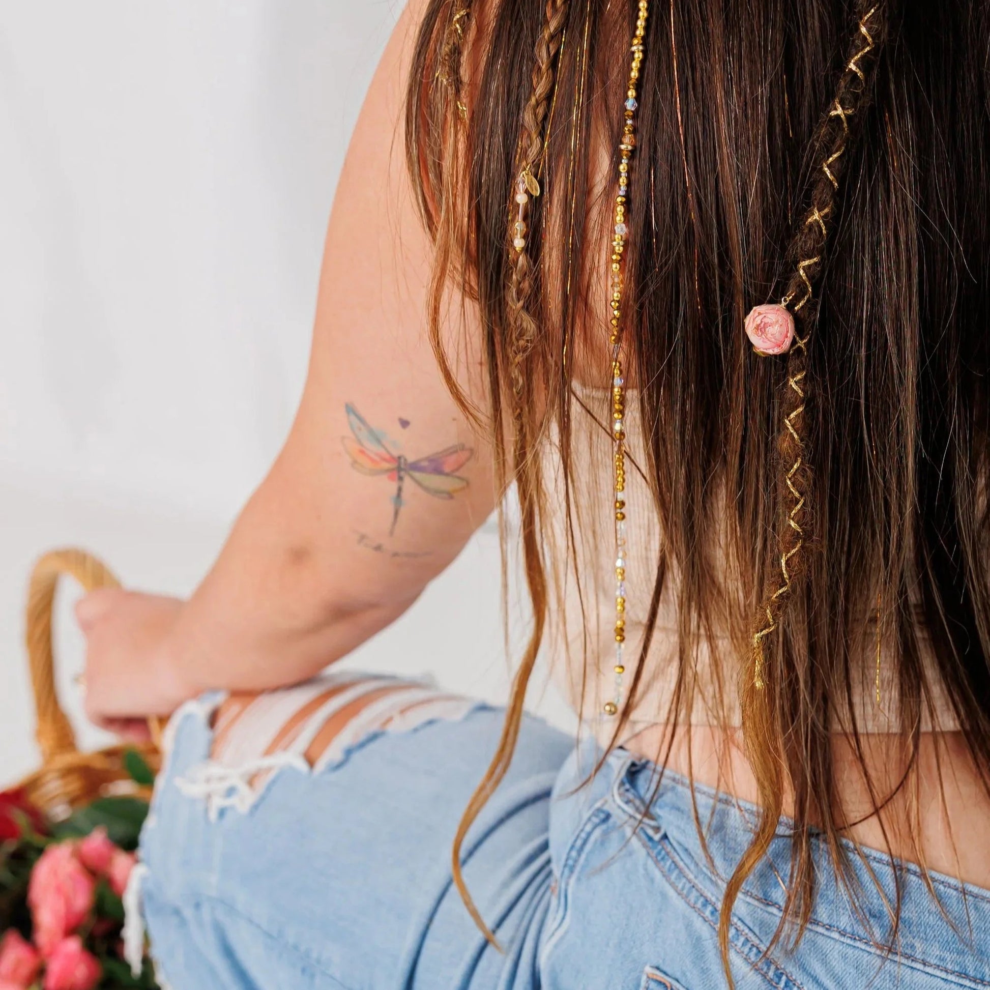 soft dark and medium brown boho braids and locks with woven shimmer threads